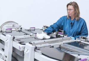 Technician cleaning a surgical table during Turn Medical biomedical technical training